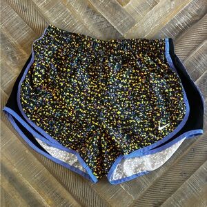 Nike Women’s Black Shorts with Multicolor Confetti and Purple Trim